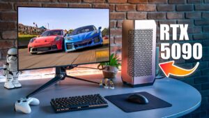 A compact gaming PC setup featuring the small RTX 5090, with vibrant RGB lighting and sleek design, showcased on a desk with gaming accessories.