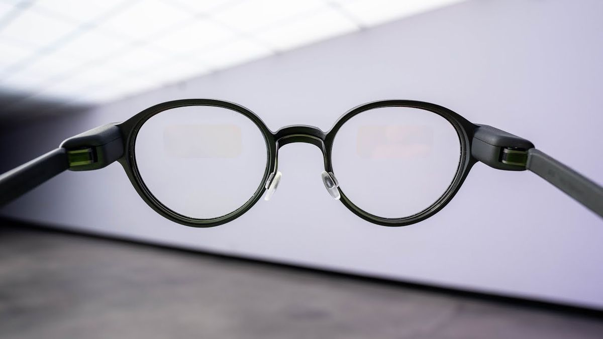 Thumbnail image of Unbox Therapy video featuring a close-up of sleek, modern smart glasses on a white background.