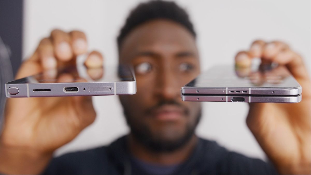 A close-up of a folded smartphone with a colorful display, set against a minimalist background.