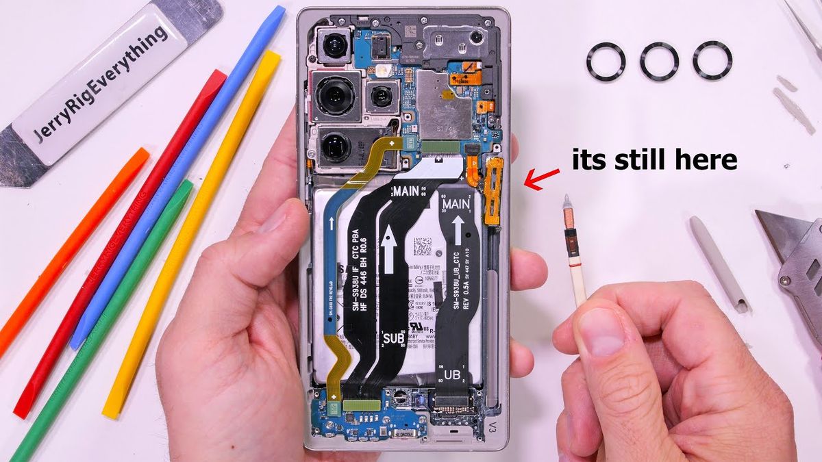 Thumbnail image of a disassembled Samsung Galaxy S25 Ultra with various internal components displayed on a table, surrounded by tools. The text overlay reads "Samsung is holding back, and I have proof!" with the JerryRigEverything logo in the corner.