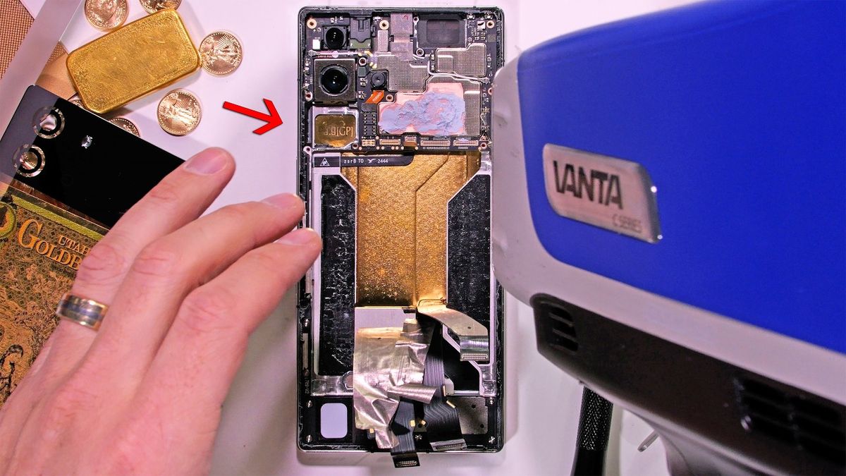 Thumbnail showing a close-up of an opened electronic device with shiny components inside, suggesting the presence of valuable materials, with the text "THEY SAID IT HAD REAL GOLD INSIDE..." prominently displayed.